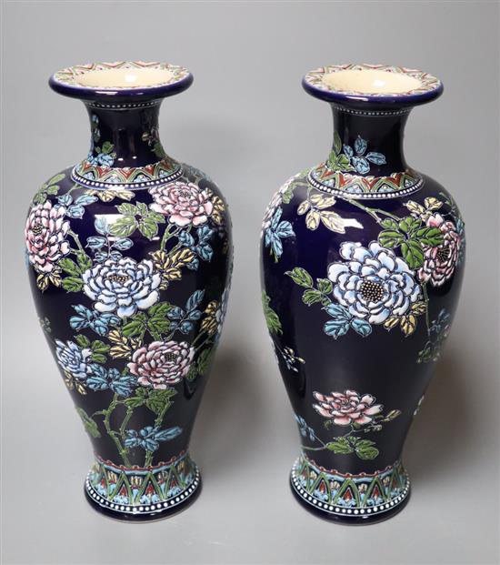 A pair of Japanese Satsuma moriage blue ground vases, early 20th century, height 26cm